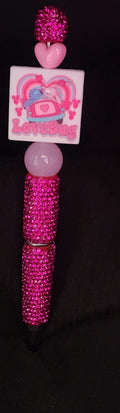 Magenta Rhinestone pen w/ stitch in car