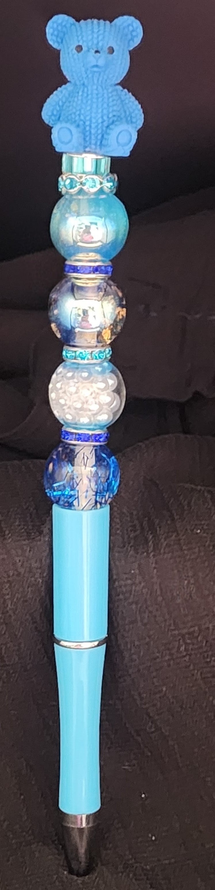 Light blue exteded pen with blue bear