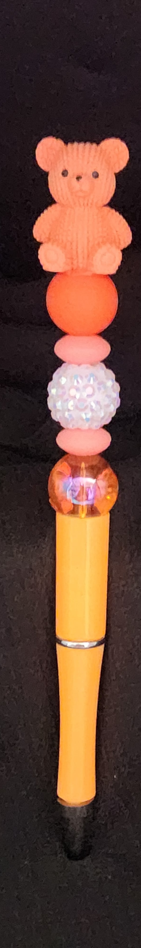 Light orange extended pen with orange bear