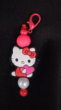 Red keychain with hello kitty