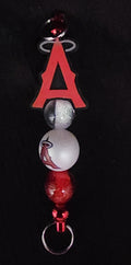 Shiny red keychain Angels A focal