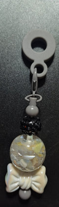 Grey Straw Charm with a bow