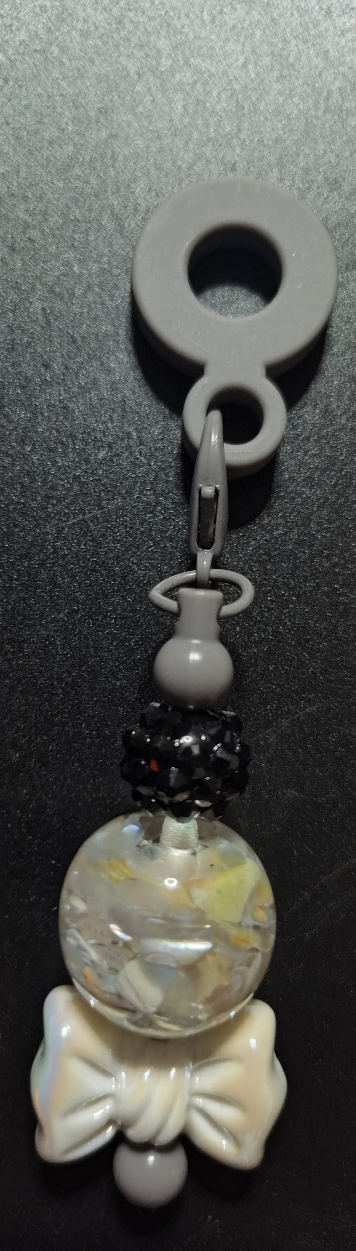 Grey Straw Charm with a bow